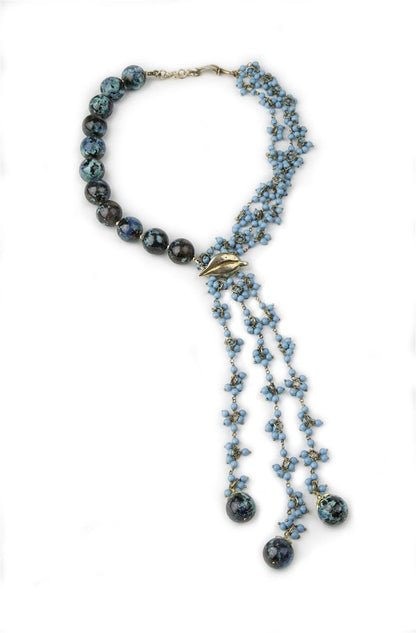 Trebor Style artisan necklace featuring large chrysocolla beads, turquoise tassel strands, and sterling silver accents.