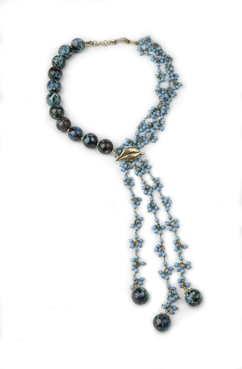 Trebor Style artisan necklace featuring large chrysocolla beads, turquoise tassel strands, and sterling silver accents.
