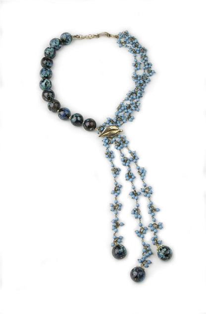 Trebor Style artisan necklace featuring large chrysocolla beads, turquoise tassel strands, and sterling silver accents.