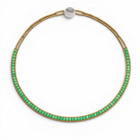 Trebor Style double strand necklace featuring vibrant green beads and polished gold-tone metal accents on a white background, handmade in Italy  by Ziio