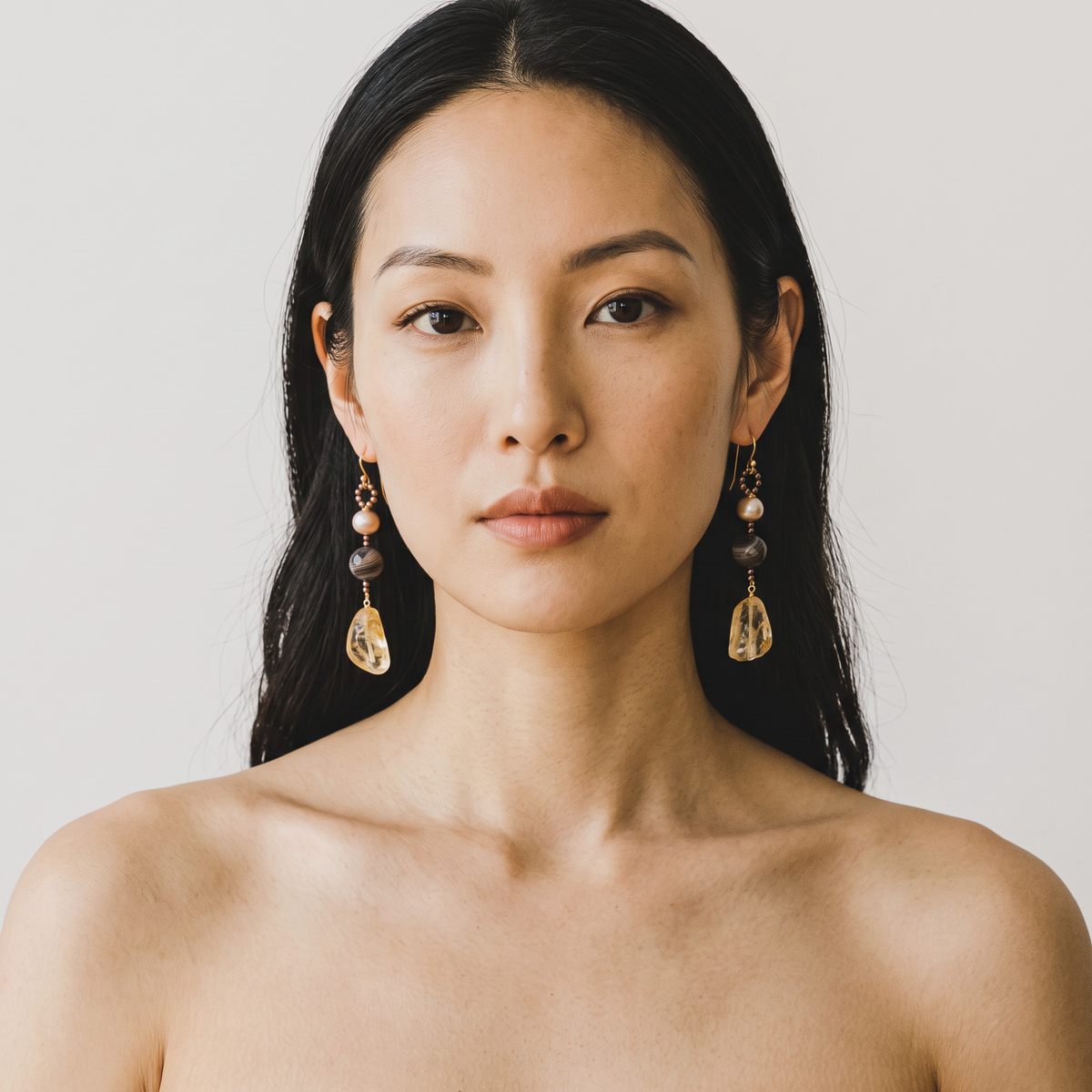 Trebor Style long drop earrings featuring champagne pearls, brown agate, and golden citrine on 18k yellow gold hooks.