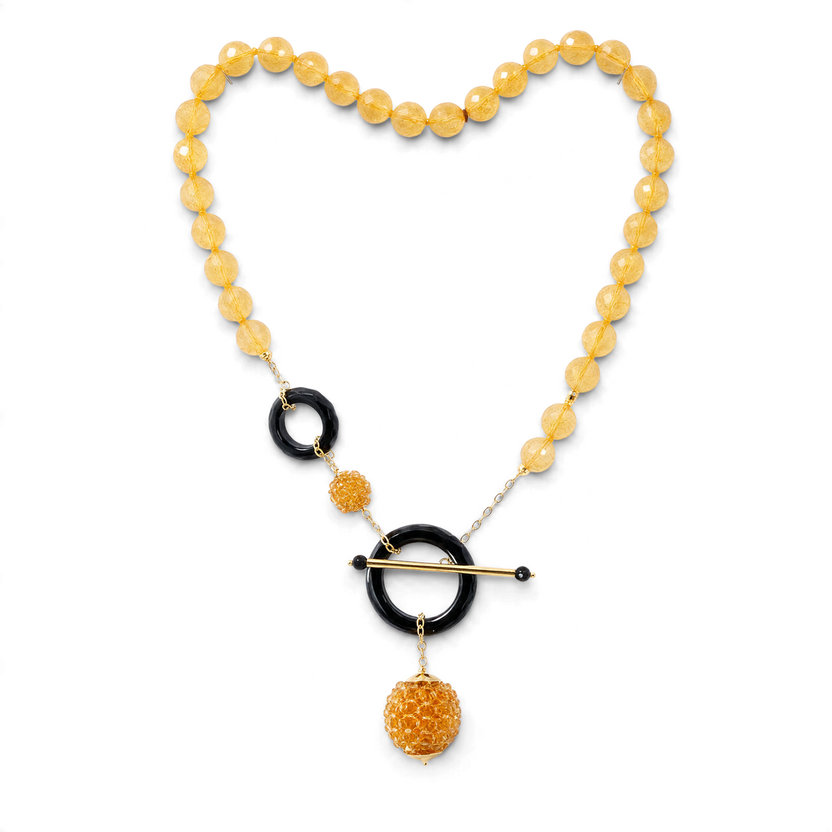 Trebor Style Rajola 18k gold necklace featuring faceted yellow citrine beads, black onyx rings, and a toggle clasp.