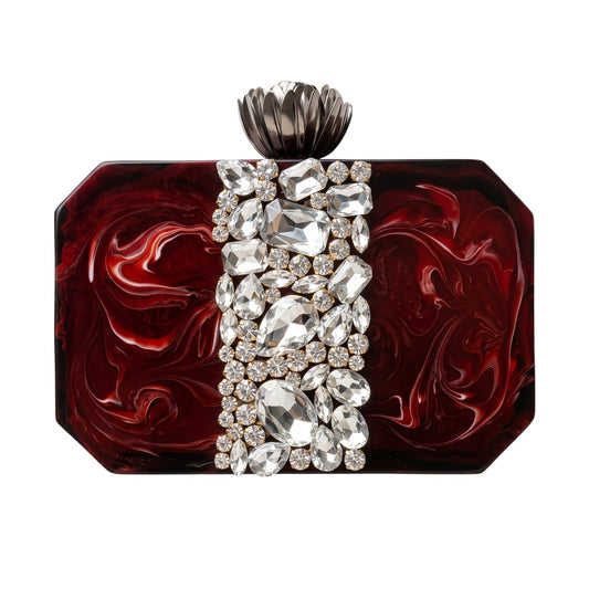 Trebor Style Roohi crimson resin clutch with hexagonal shape, clear gem embellishments, and a metallic lotus clasp.