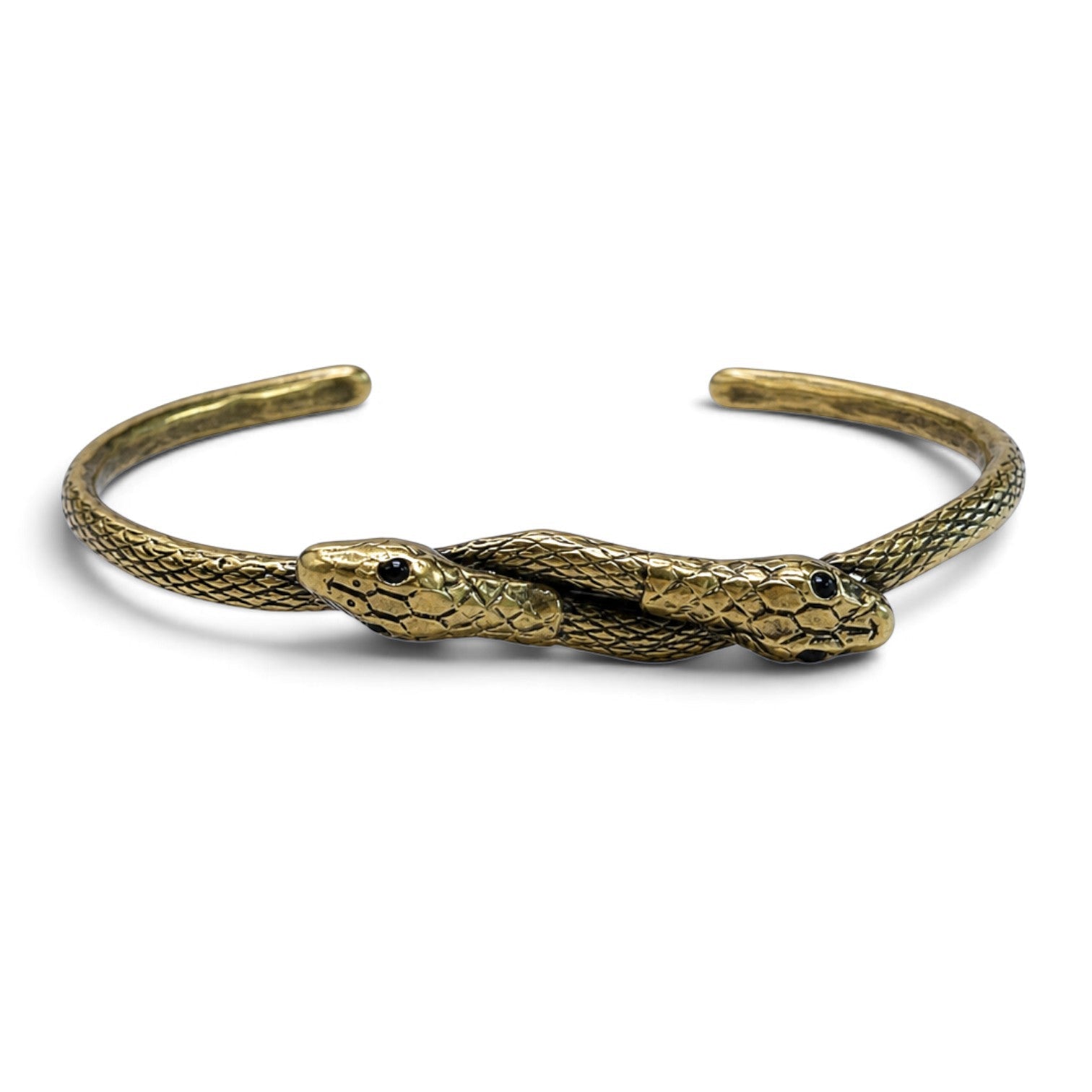 Trebor Style thin double serpent bangle in reclaimed copper and zinc with Austrian crystal eyes on a white background