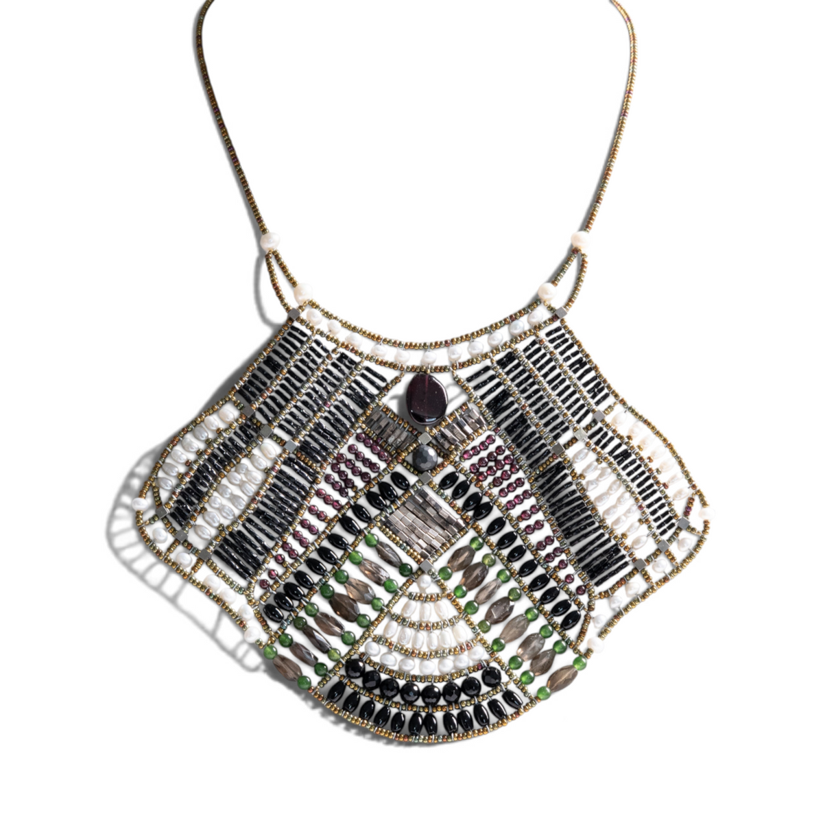 Trebor Style Falena statement bib necklace featuring onyx, garnet, pearls, and murano glass beads on a white mannequin.
