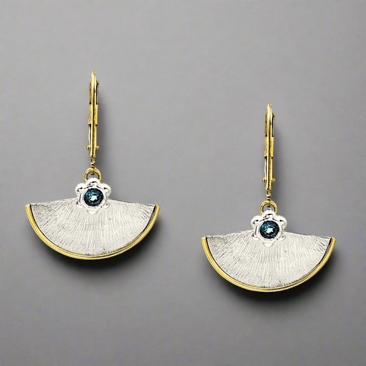 Trebor Style fan-shaped sterling silver earrings with 14kt gold-filled borders and London Blue Topaz gemstones.