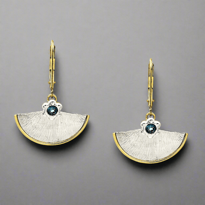 Trebor Style fan-shaped sterling silver earrings with 14kt gold-filled borders and London Blue Topaz gemstones.