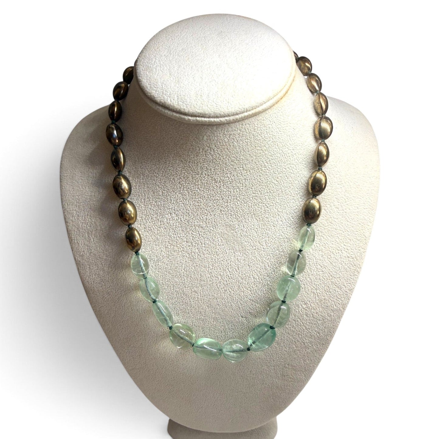 Trebor Style handcrafted statement necklace featuring pale green fluorite beads and metallic bronze oval accents.