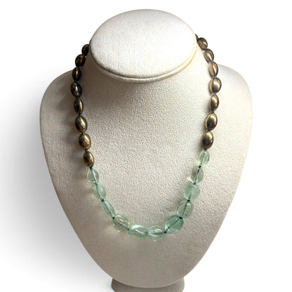 Trebor Style handcrafted statement necklace featuring pale green fluorite beads and metallic bronze oval accents.