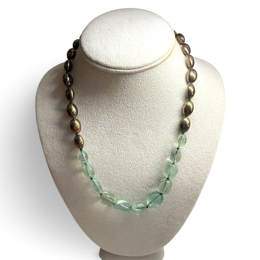 Trebor Style handcrafted statement necklace featuring pale green fluorite beads and metallic bronze oval accents.