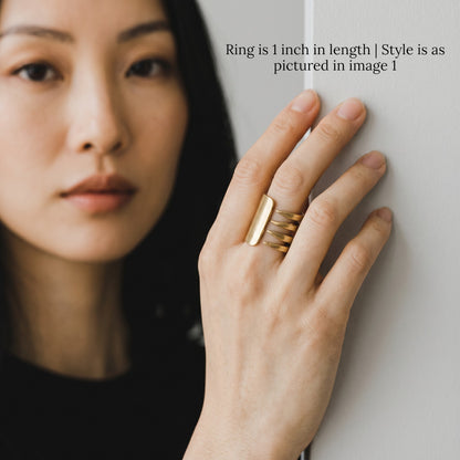 Trebor Style handmade fork ring in reclaimed copper and zinc worn on a woman's finger, featuring a unique utensil design