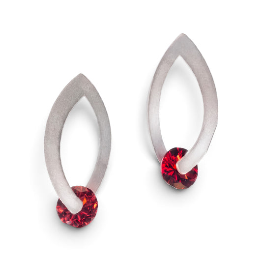 Trebor Style long drop earrings featuring faceted ruby red garnet gemstones set in brushed rhodium-plated sterling silver