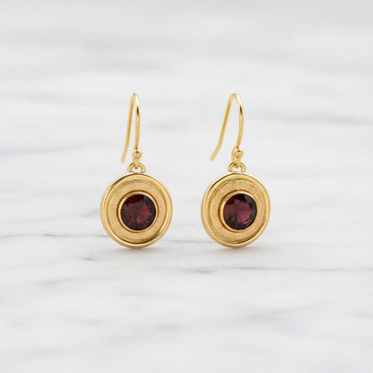 Trebor Style garnet earrings featuring 6mm crimson stones in 14K gold-filled double halo frames with textured detail.