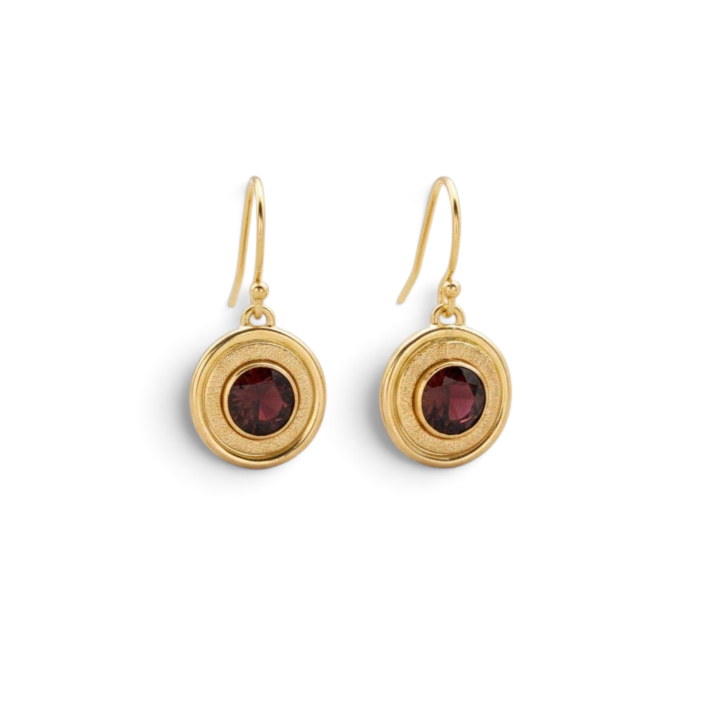 Trebor Style garnet earrings featuring 6mm crimson stones in 14K gold-filled dual-halo frames with textured detail.