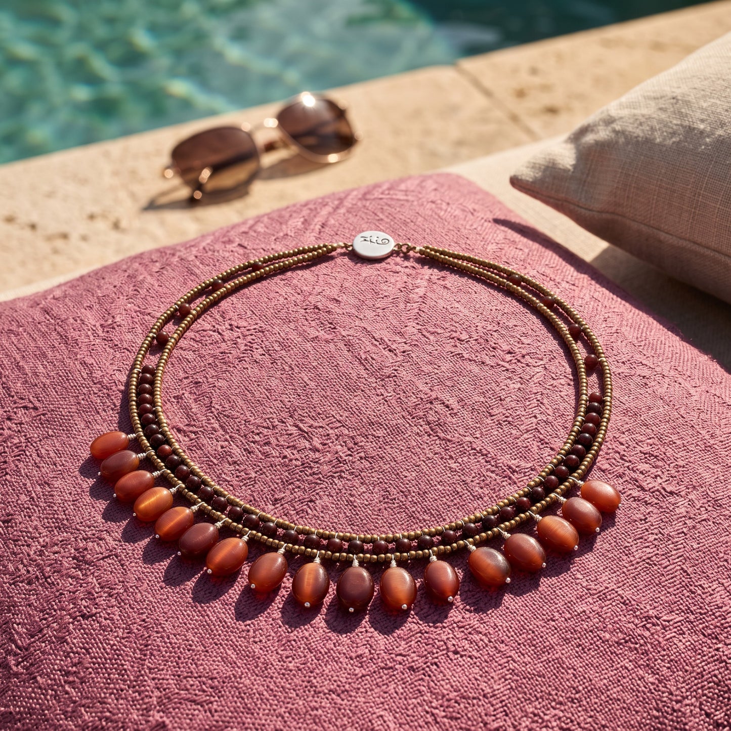 Trebor Style multi-strand beaded necklace with bronze seed beads, dark garnet accents, and dangling carnelian beads.