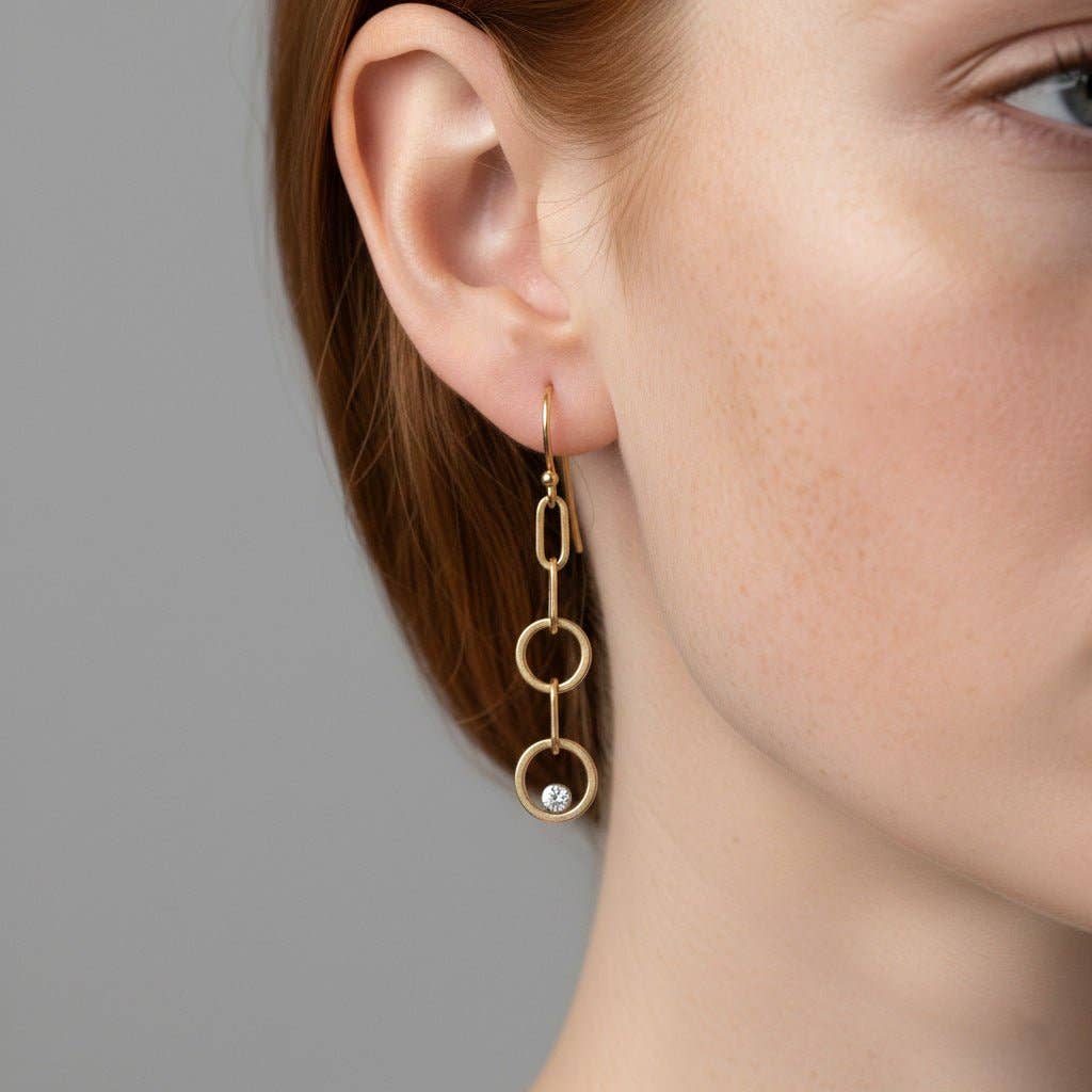 Trebor Style double circle drop earrings in 14K gold-filled with lab-grown diamonds worn on a model