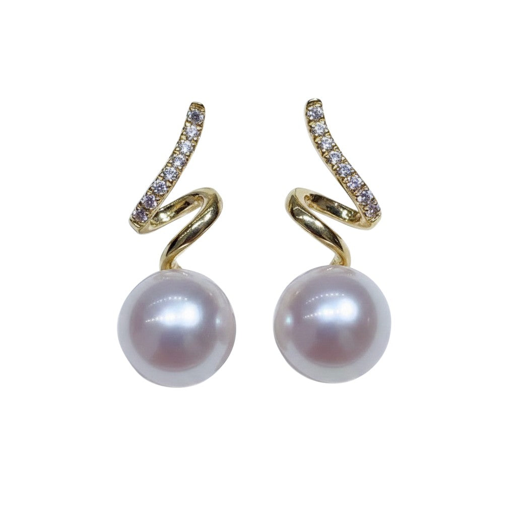 Trebor Style 14k gold spiral earrings featuring round Edison pearls and sparkling zircon accents.