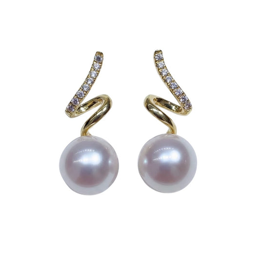 Trebor Style 14k gold spiral earrings featuring round Edison pearls and sparkling zircon accents.