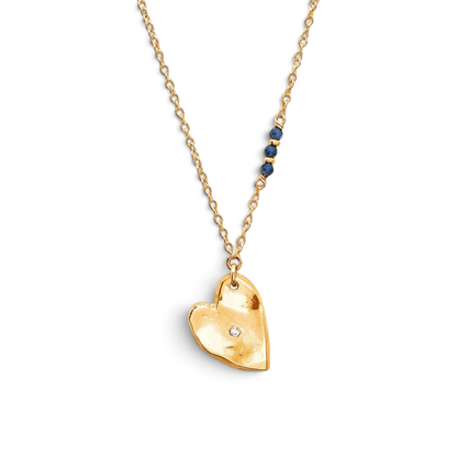Trebor Style handcrafted 14K vermeil heart necklace with a lab diamond and blue sapphire accents on a gold chain.