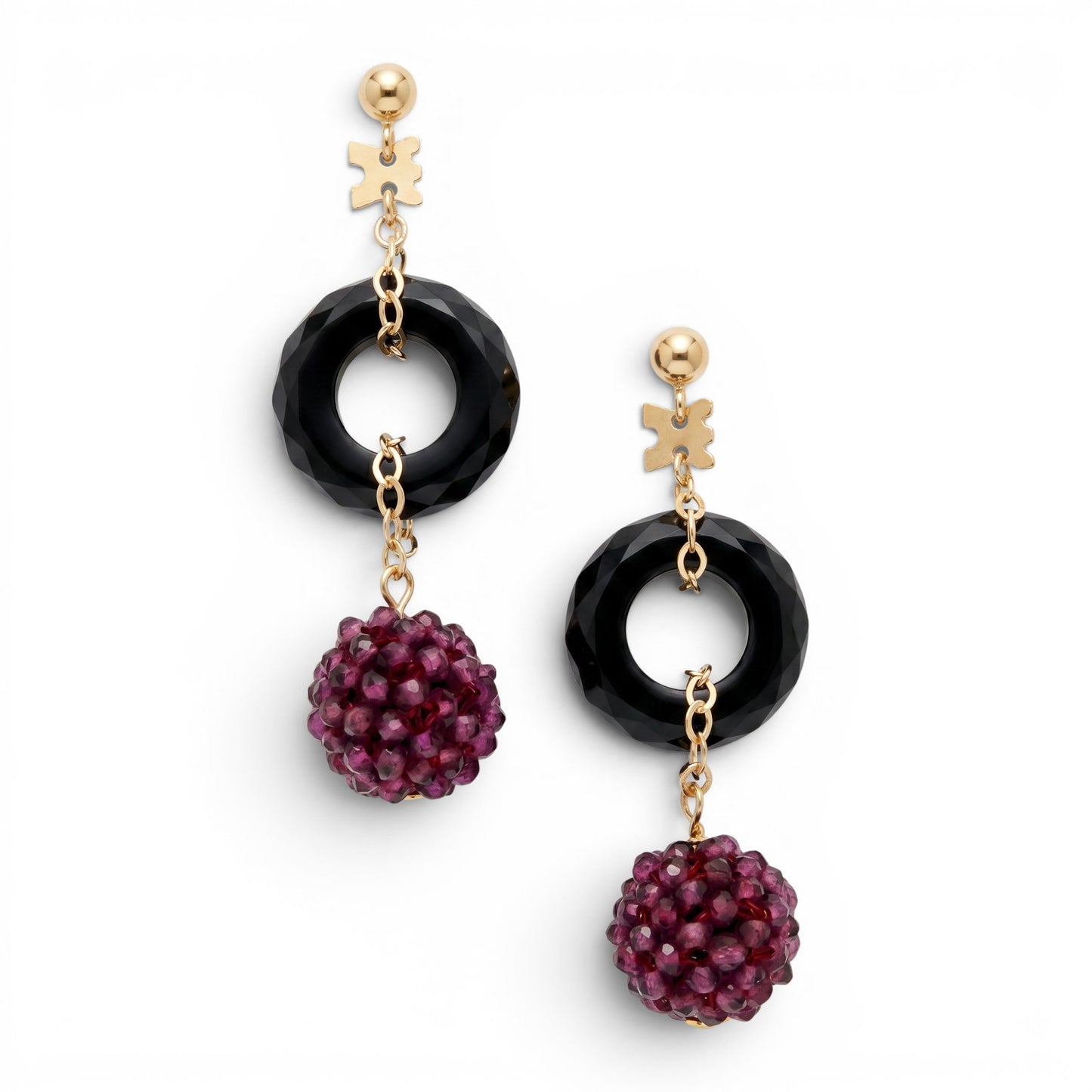 Trebor Style 18k gold drop earrings featuring faceted black onyx rings and purple garnet beaded spheres.