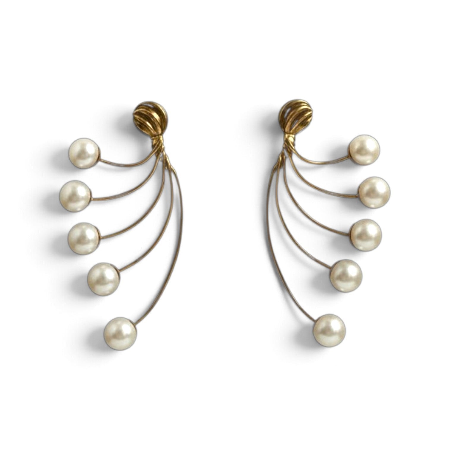 Trebor Style gold-tone fan-style statement earrings featuring cascading cream faux pearls on delicate wire-work arcs.