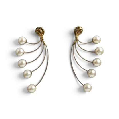Trebor Style gold-tone fan-style statement earrings featuring cascading cream faux pearls on delicate wire-work arcs.