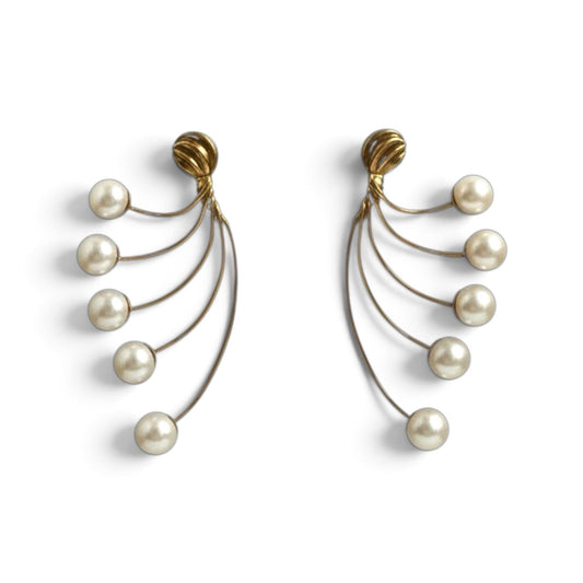 Trebor Style gold-tone fan-style statement earrings featuring cascading cream faux pearls on delicate wire-work arcs.