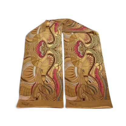 Trebor Style Ziio silk satin tube scarf in gold and beige with a vibrant jungle print pattern.
