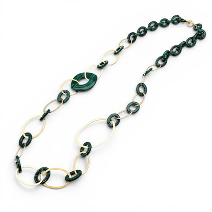 Trebor Style long statement necklace featuring dark green acrylic links and 24k gold-plated oval metal accents.
