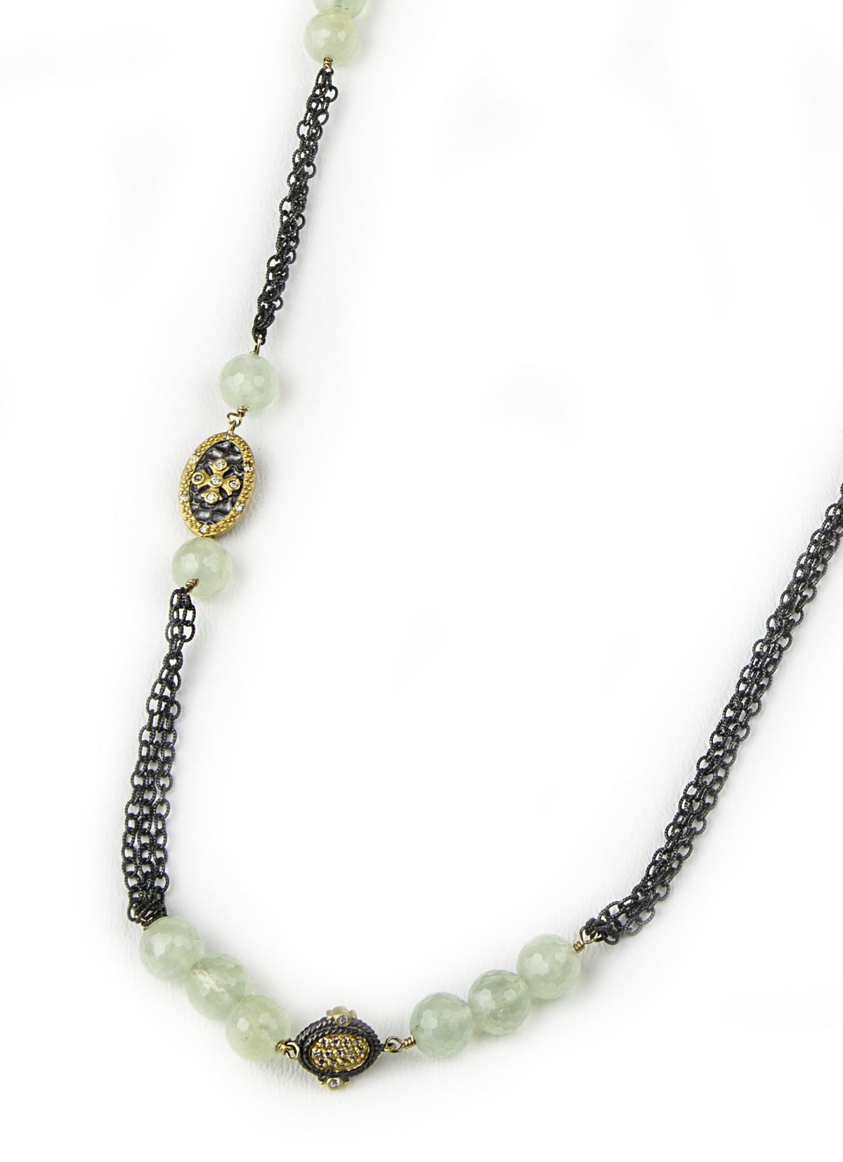 Trebor Style long necklace featuring faceted green tourmaline, 22k gold medallions, and white topaz on a dark chain.