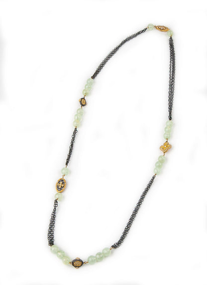 Trebor Style long necklace featuring green tourmaline beads, 22k gold medallions with white topaz, and rhodium chain.