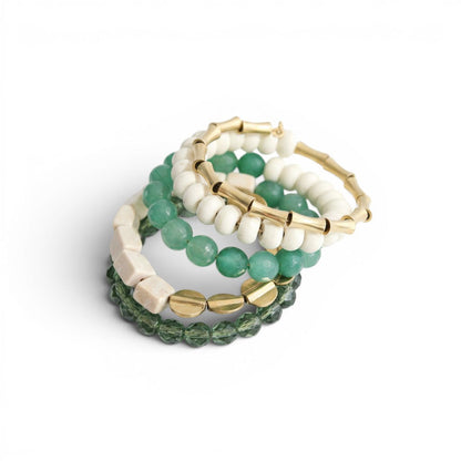 Trebor Style handcrafted wrap bracelet featuring green glass, white magnesite beads, and gold-tone brass accents.