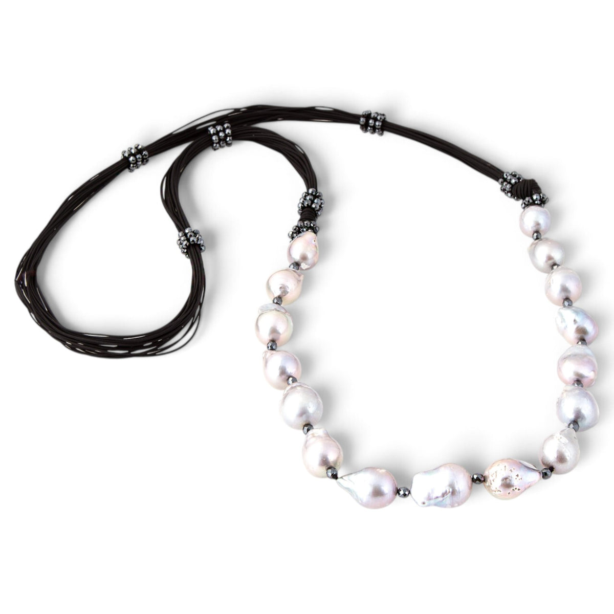 Trebor Style long necklace featuring large grey baroque pearls and sparkling pyrite beads on multi-strand black cord.