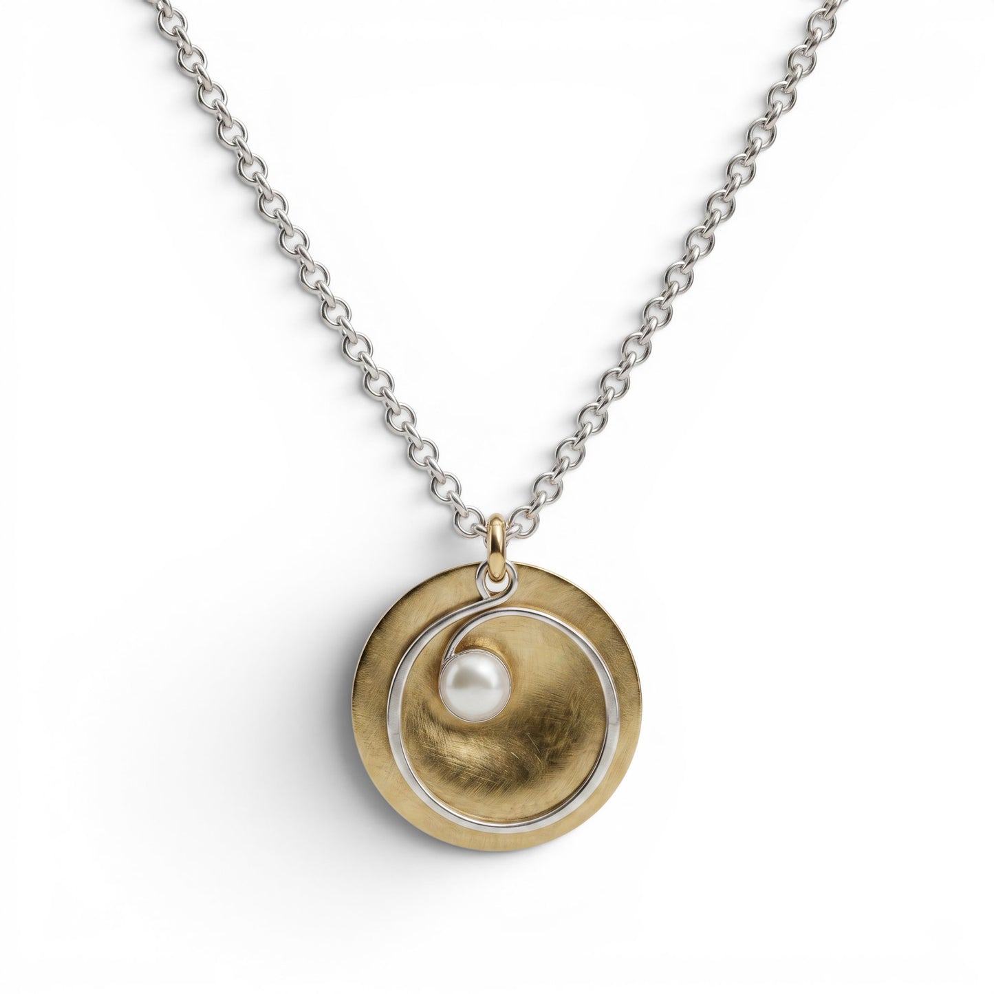 Trebor Style hammered brass disc pendant necklace with a silver spiral wire and white pearl on a silver link chain.