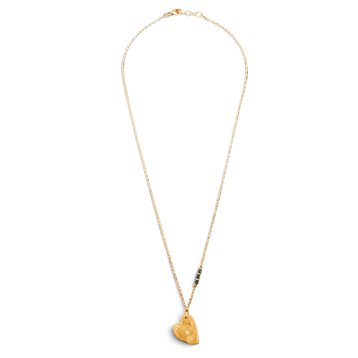 Trebor Style Heart of Gold necklace featuring a hammered 14K vermeil heart pendant with a lab diamond and blue sapphires