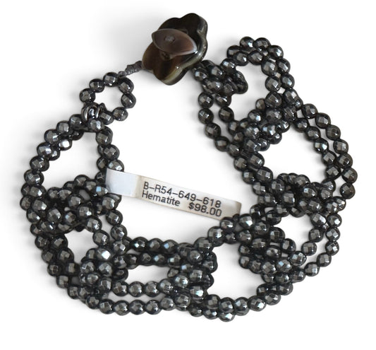 Trebor Style Rajola faceted dark grey hematite bead infinity link bracelet with a mother of pearl toggle closure
