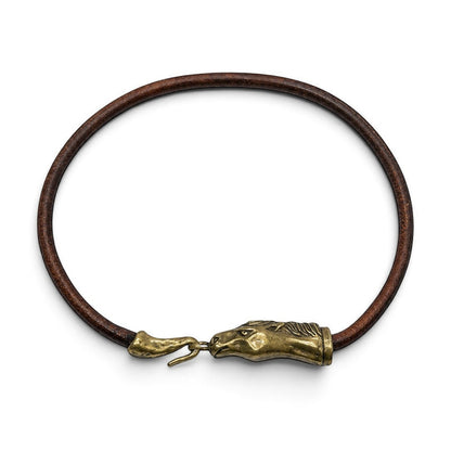 Trebor Style Wild Spirit horse choker with a sculpted gold patina horse-head clasp on a brown leather cord.