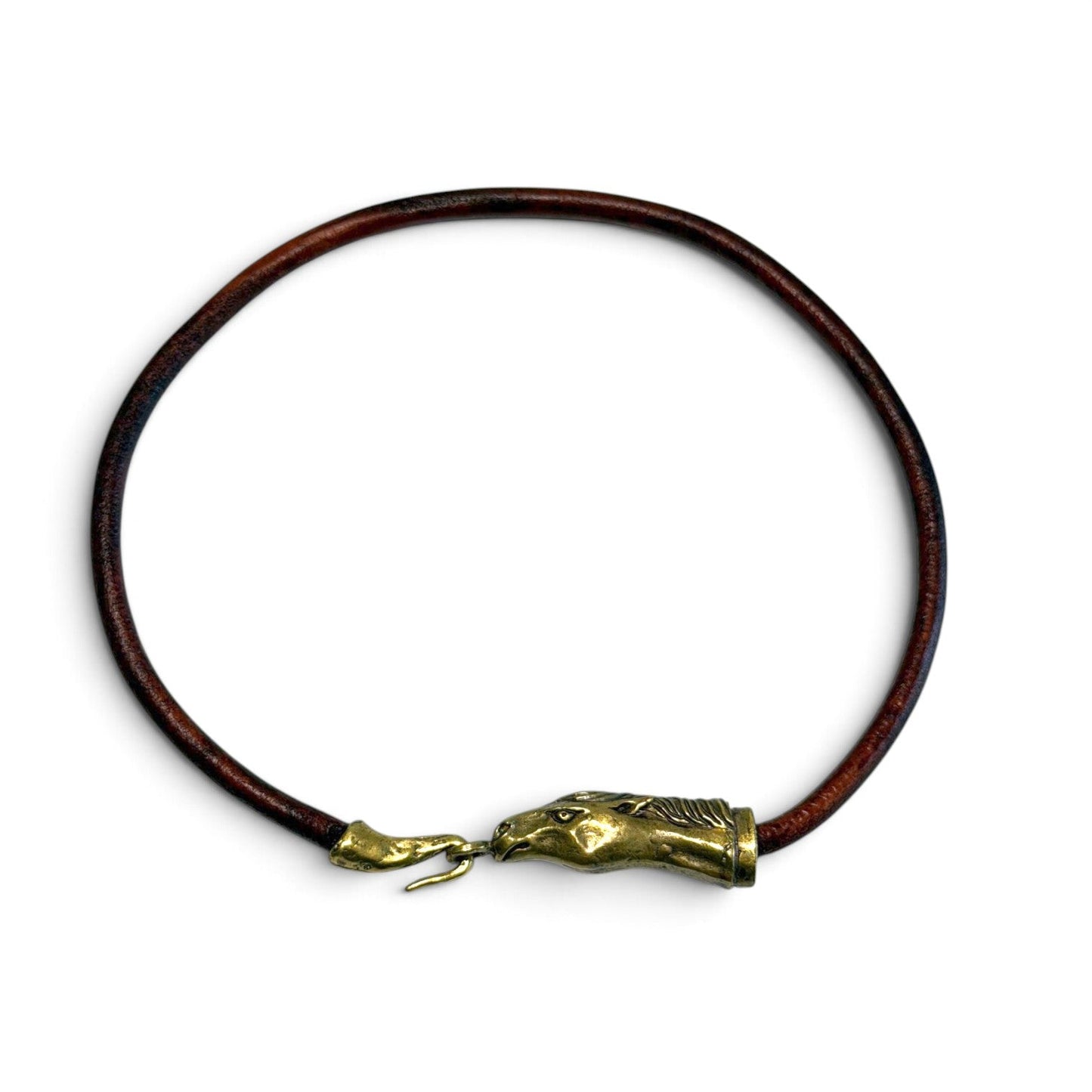 Trebor Style Wild Spirit horse choker with a dark brown leather cord and a sculpted gold patina horse head clasp.