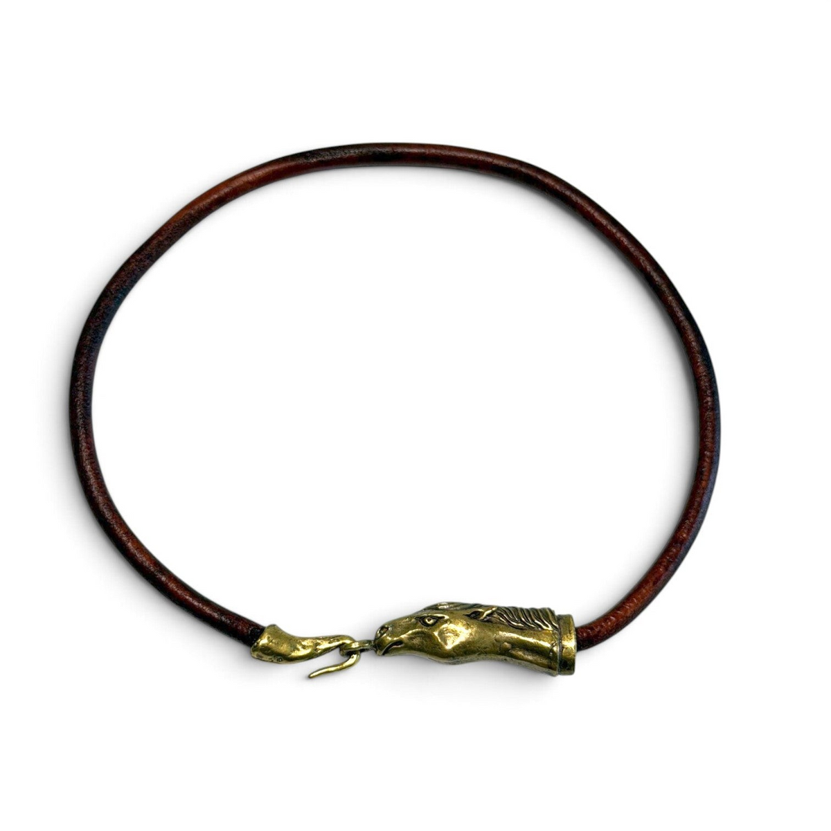 Trebor Style Wild Spirit horse choker with a dark brown leather cord and a sculpted gold patina horse head clasp.