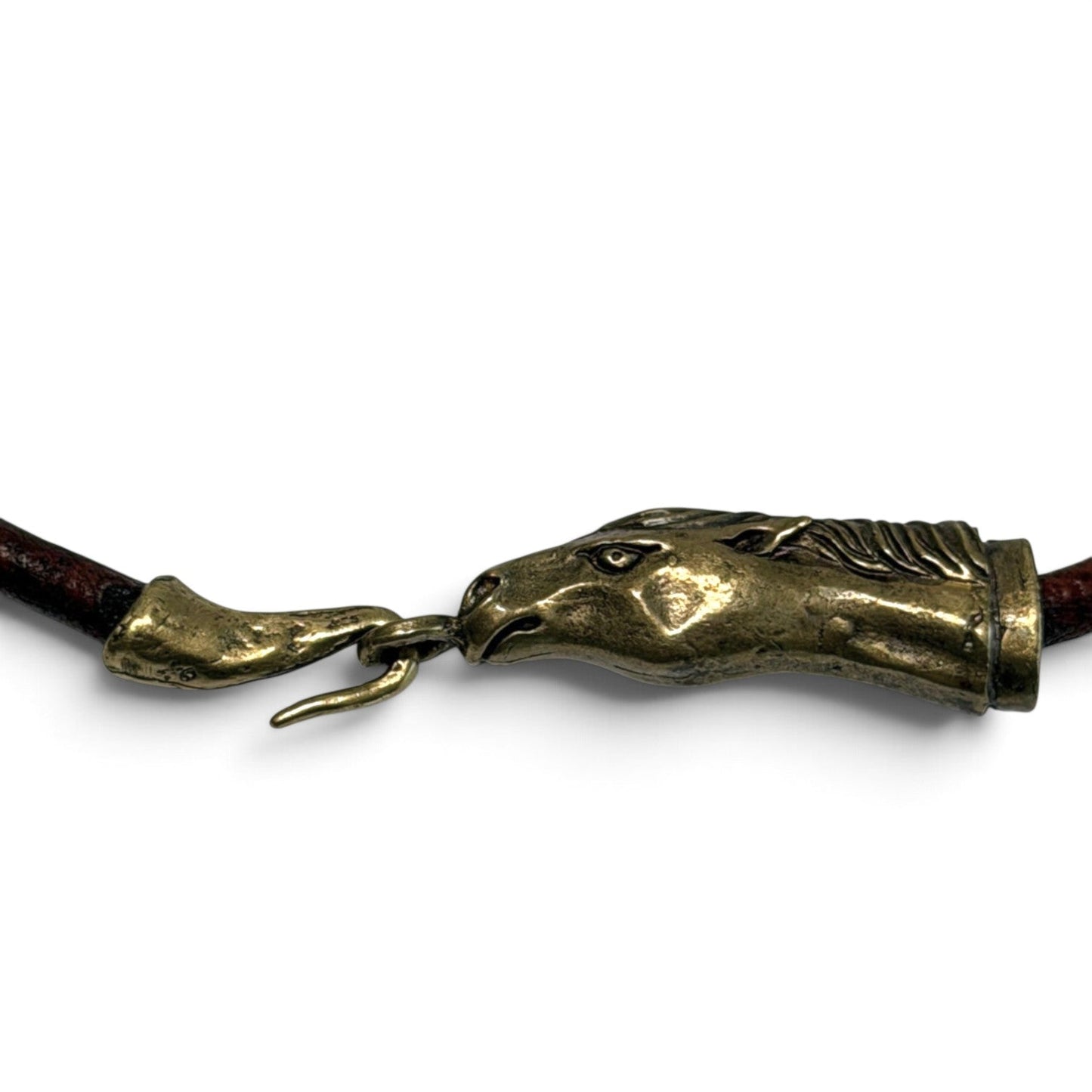 Trebor Style Wild Spirit horse head choker in reclaimed gold patina with a dark leather cord.