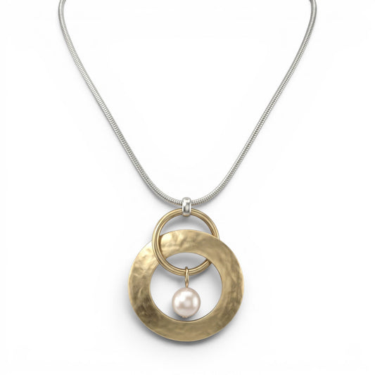 Trebor Style silver snake chain necklace featuring interlocking gold rings and a central cream Austrian crystal pearl.