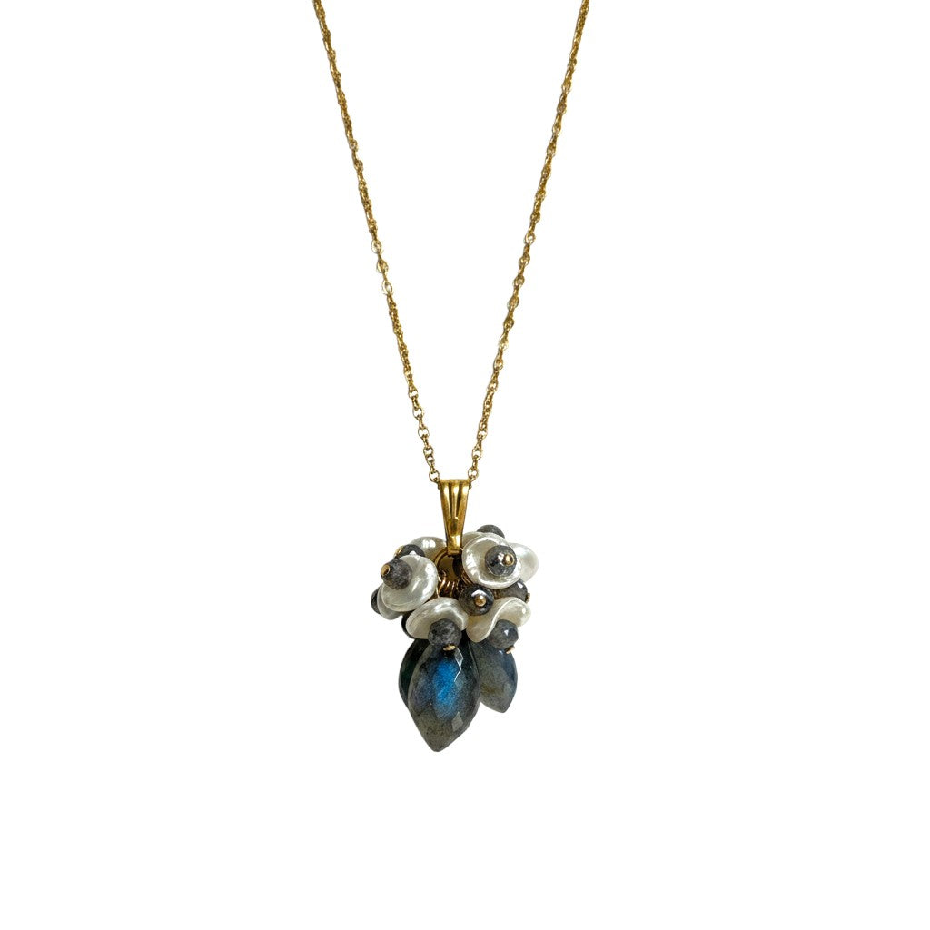 Trebor Style pendant necklace featuring grey-blue labradorite gemstones and white keshi pearls on a gold wheat chain.