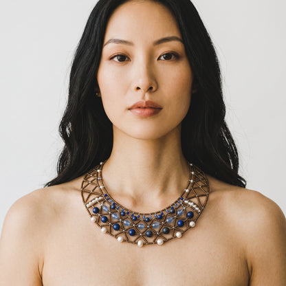 Trebor Style necklace featuring blue lapis, kyanite, Murano glass, and pearls in a handcrafted lattice design.