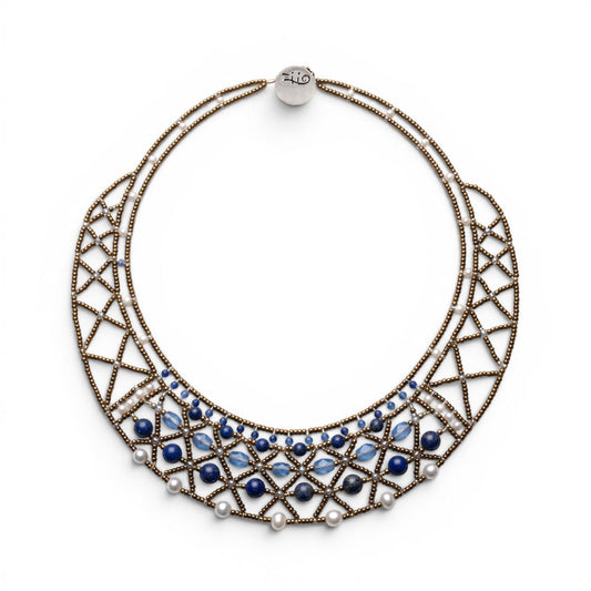 Trebor Style handmade necklace featuring blue lapis, kyanite, Murano glass beads, and freshwater pearls in a lattice.