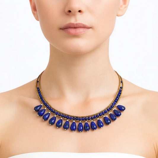 Trebor Style Lapis Lazilu necklace featuring blue teardrop gemstones, water pearls, and Murano glass on steel wire.