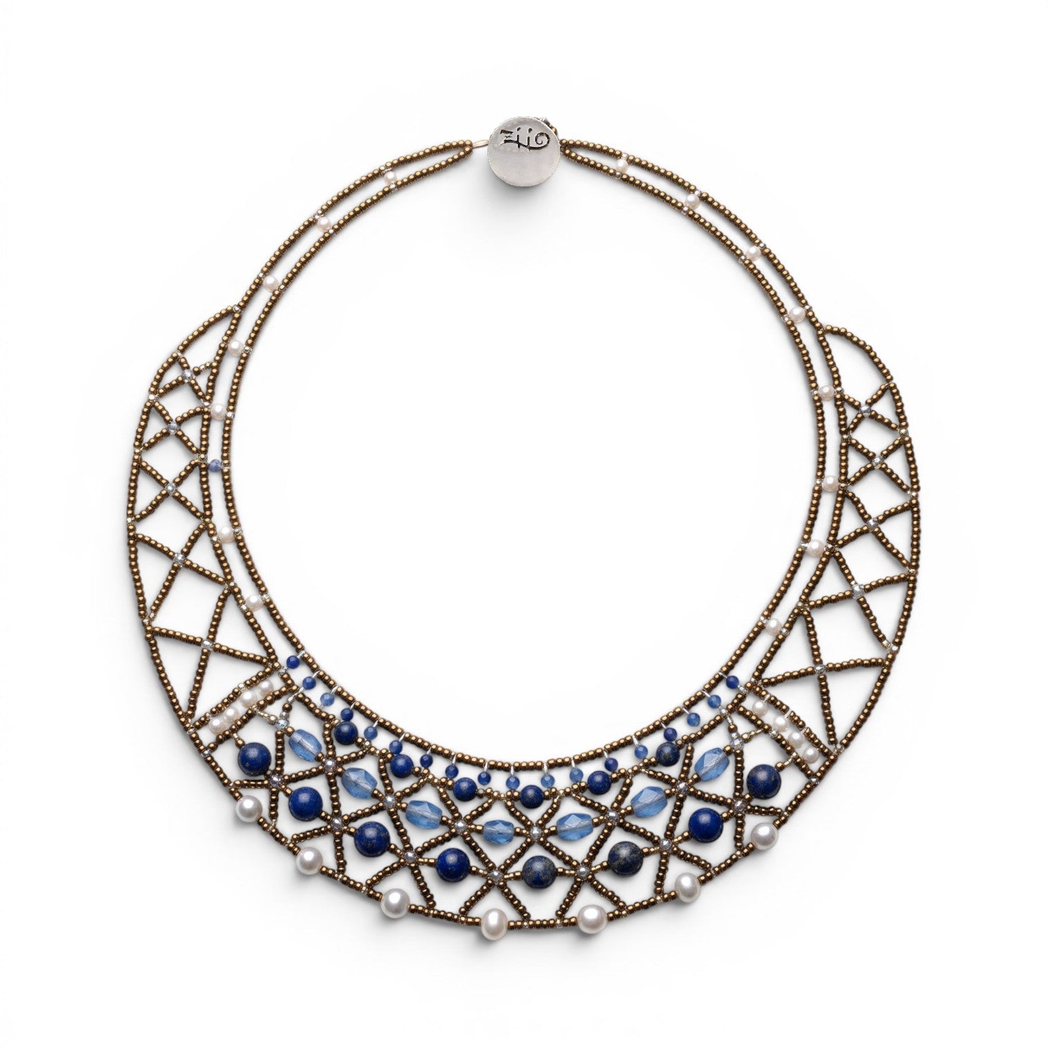 Trebor Style artisan statement necklace featuring a gold lattice structure with blue lapis, kyanite, and white pearls.