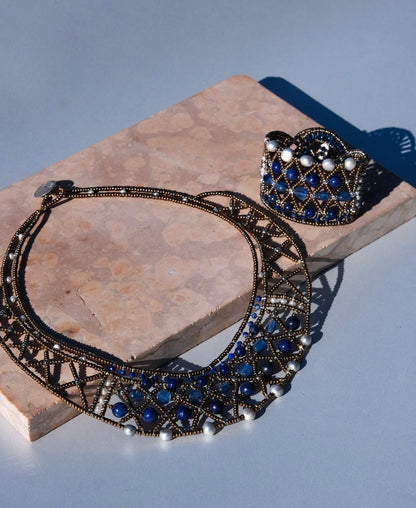 Trebor Style artisan necklace and matching cuff featuring blue lapis, kyanite, pearls, and gold lattice beadwork.