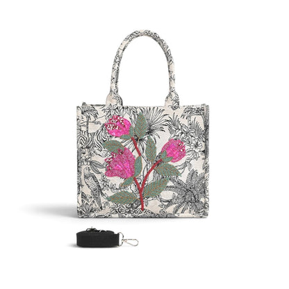 Trebor Style structured tote bag in black and cream leopard print with pink and red beaded floral embellishment.
