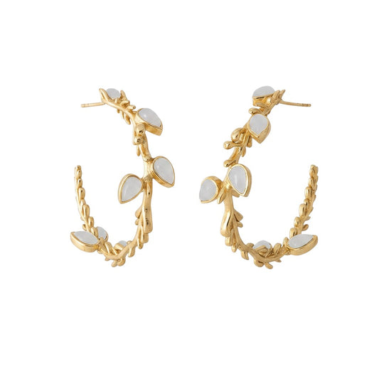 Trebor Style Lika hoop earrings in 24k gold plated metal with branch-like details and white drusa quartz stones.