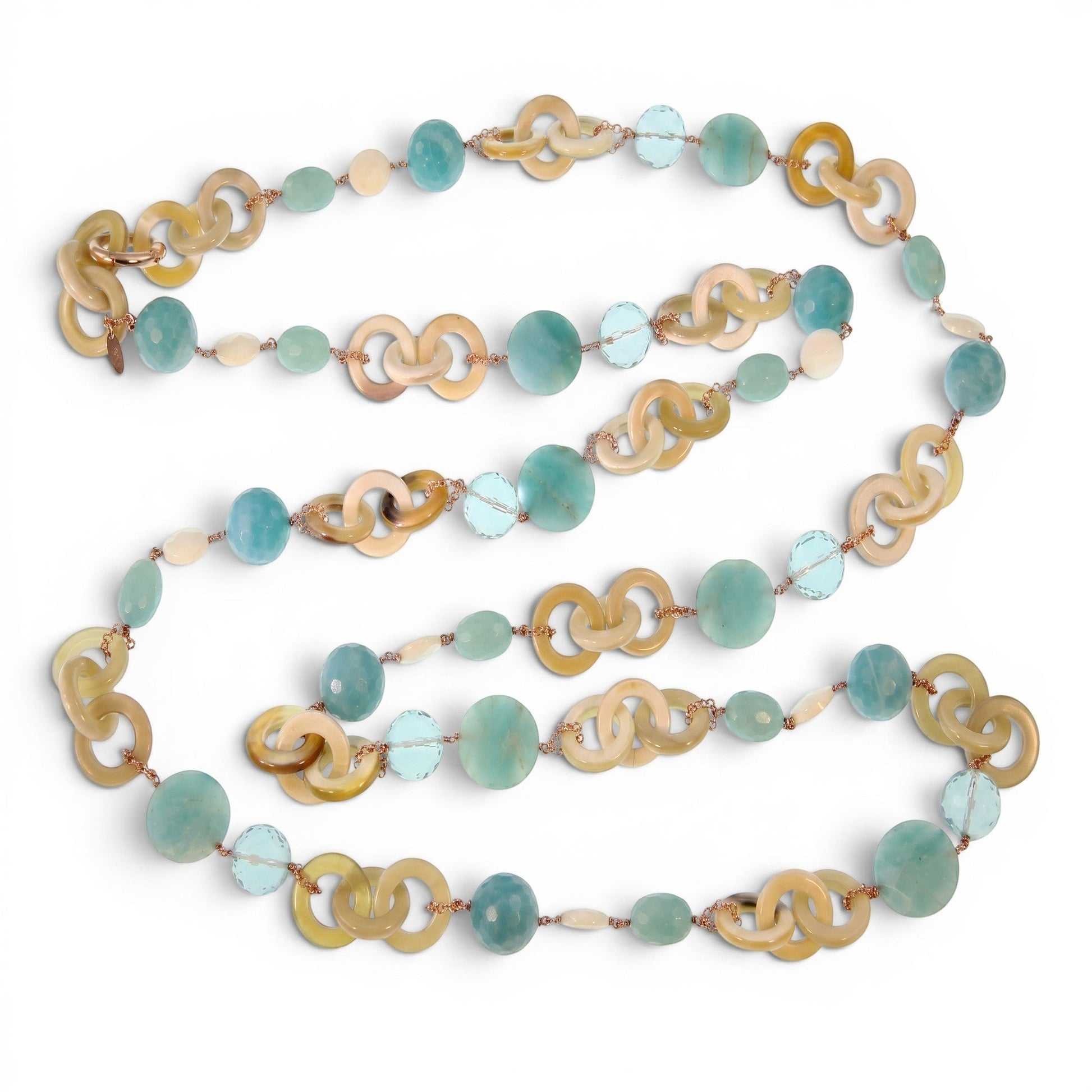 Trebor Style long necklace featuring tan horn, turquoise chalcedony, crystal, and pearl beads on rose gold silver chain.